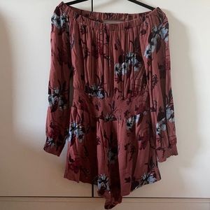 Women’s floral romper cut out back size M